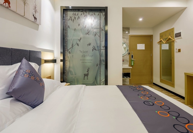 Imagen de la habitación del Hotel Yimi Inn Guangzhou Changdi Branch. Foto 15