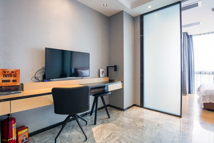Imagen de la habitación del Hotel Yimi Mix International Apartment Beijing Road Bran. Foto 18