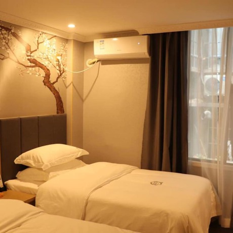 Imagen de la habitación del Hotel Yimi Ou Zhuang Metro Station. Foto 13