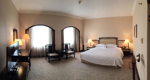 Imagen de la habitación del Hotel Yindo Zhuhai. Foto 5
