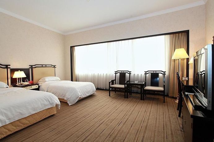 Imagen de la habitación del Hotel Yindo Zhuhai. Foto 7