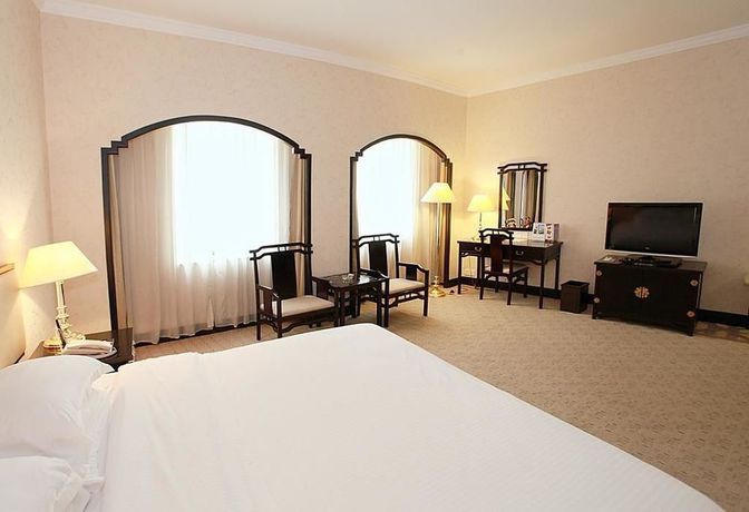Imagen de la habitación del Hotel Yindo Zhuhai. Foto 9