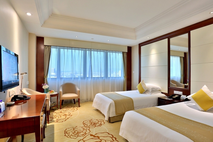 Imagen de la habitación del Hotel Yindu Yiwu. Foto 4