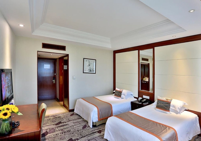 Imagen de la habitación del Hotel Yindu Yiwu. Foto 8