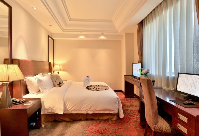 Imagen de la habitación del Hotel Yindu Yiwu. Foto 14