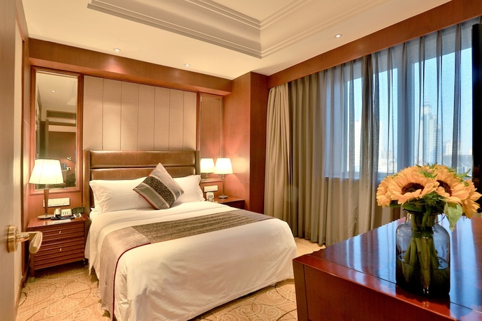 Imagen de la habitación del Hotel Yindu Yiwu. Foto 16