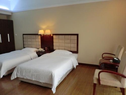 Imagen de la habitación del Hotel Yinfeng International Apartment. Foto 7