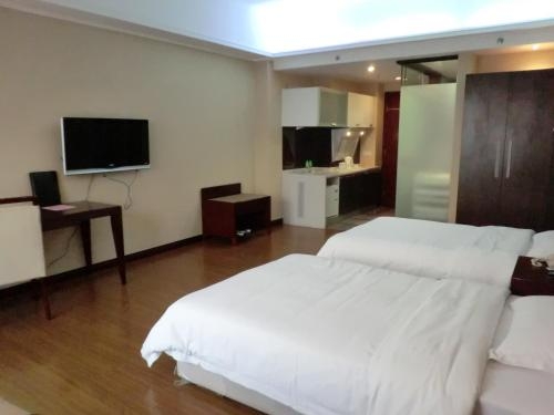 Imagen de la habitación del Hotel Yinfeng International Apartment. Foto 9