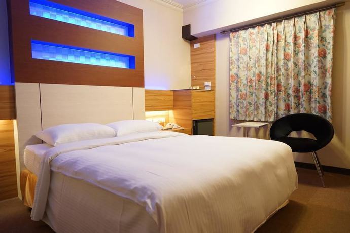 Imagen de la habitación del Hotel Ying Dai. Foto 17