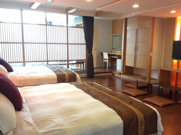 Imagen de la habitación del Hotel Ying Xiang Wen Quan. Foto 14