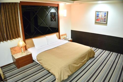 Imagen de la habitación del Hotel Ying Zhen. Foto 7