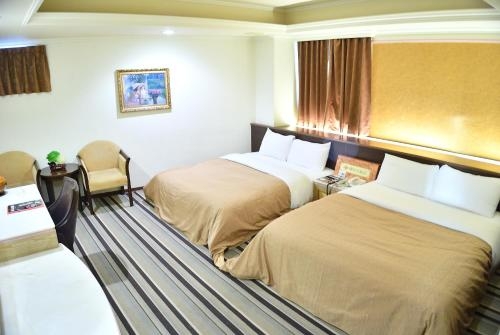 Imagen de la habitación del Hotel Ying Zhen. Foto 9