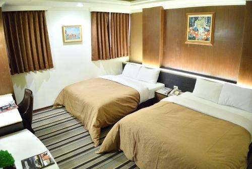 Imagen de la habitación del Hotel Ying Zhen. Foto 10