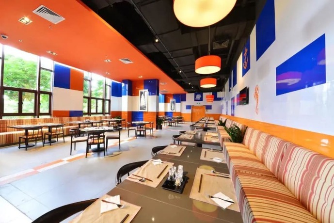 Imagen del bar/restaurante del Hotel Yinghai Apartment Zhuhai Chimelong. Foto 8