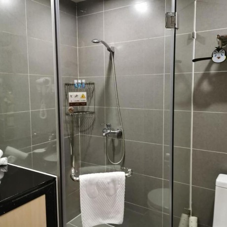 Imagen de la habitación del Hotel Yinghai Apartment Zhuhai Chimelong. Foto 11