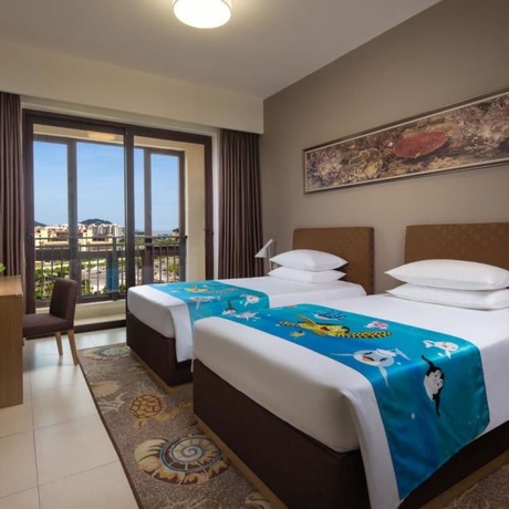 Imagen de la habitación del Hotel Yinghai Apartment Zhuhai Chimelong. Foto 12