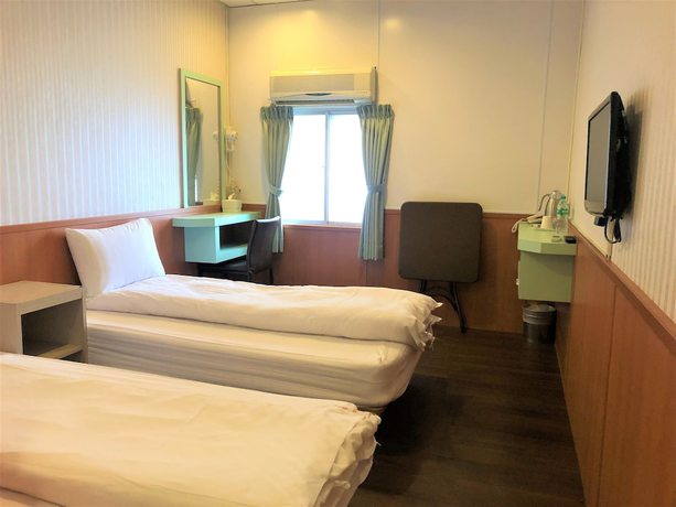 Imagen de la habitación del Hotel Yinglun Hotel. Foto 4