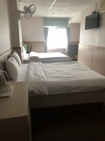 Imagen de la habitación del Hotel Yinglun Hotel. Foto 7