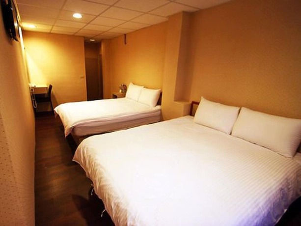 Imagen de la habitación del Hotel Yinglun Hotel. Foto 13