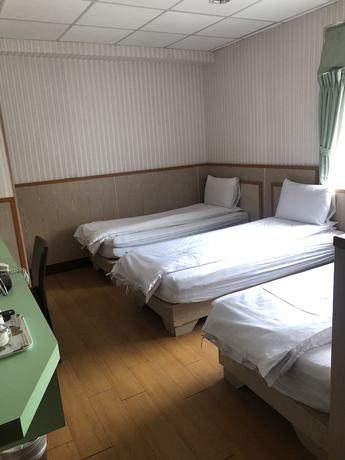 Imagen de la habitación del Hotel Yinglun Hotel. Foto 15