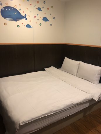 Imagen de la habitación del Hotel Yinglun Hotel. Foto 17