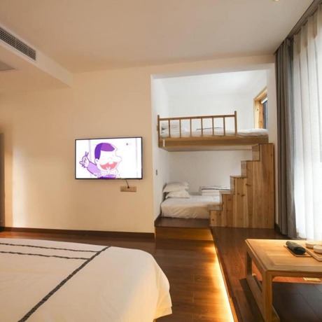 Imagen de la habitación del Hotel Yinlu Bedroom Fenghuang Hongqiao Shop. Foto 14