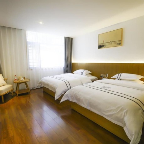Imagen de la habitación del Hotel Yinlu Bedroom Fenghuang Hongqiao Shop. Foto 21
