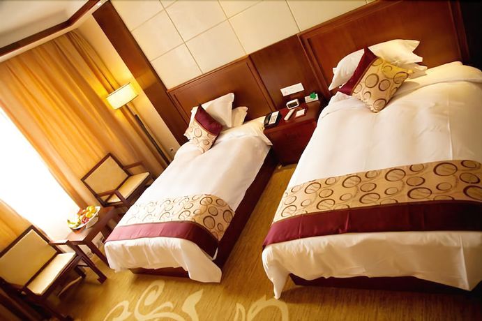 Imagen de la habitación del Hotel Yinxiang Shanshui Hotel. Foto 14