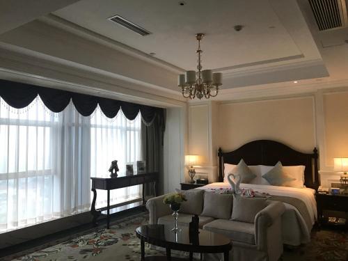 Imagen de la habitación del Hotel Yinxin Century. Foto 7
