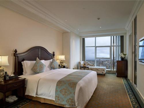 Imagen de la habitación del Hotel Yinxin Century. Foto 9