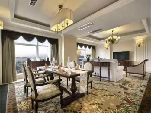 Imagen de la habitación del Hotel Yinxin Century. Foto 10