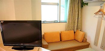 Imagen de la habitación del Hotel Yinzuo Jiayi - Qingdao. Foto 11