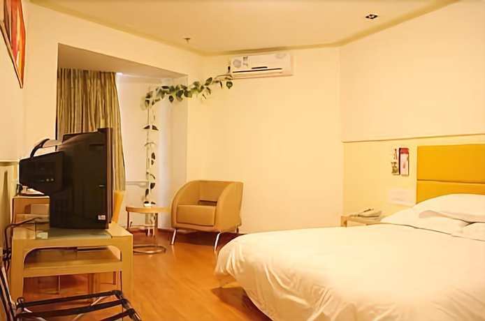 Imagen de la habitación del Hotel Yinzuo Jiayi - Qingdao. Foto 14