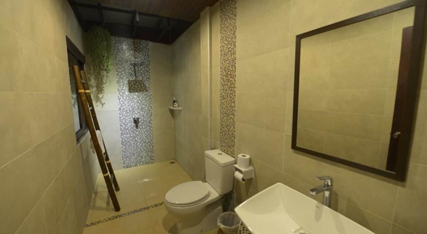 Imagen de la habitación del Hotel Yi's Garden Villa. Foto 2