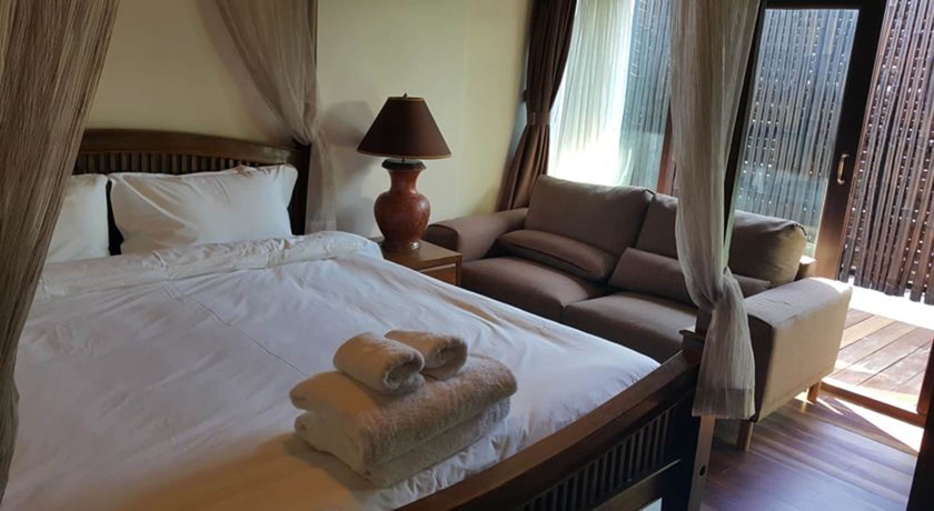 Imagen de la habitación del Hotel Yi's Garden Villa. Foto 5