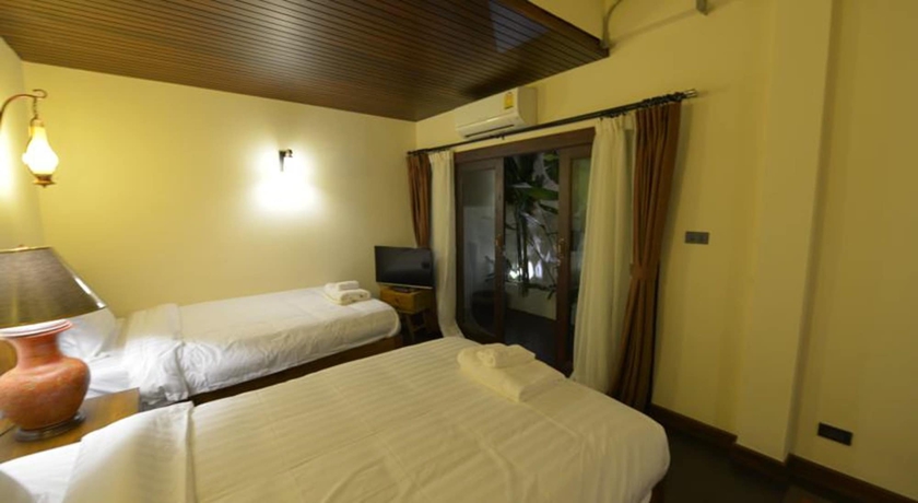 Imagen de la habitación del Hotel Yi's Garden Villa. Foto 7