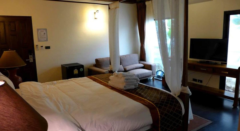 Imagen de la habitación del Hotel Yi's Garden Villa. Foto 9