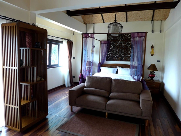 Imagen de la habitación del Hotel Yi's Garden Villa. Foto 10
