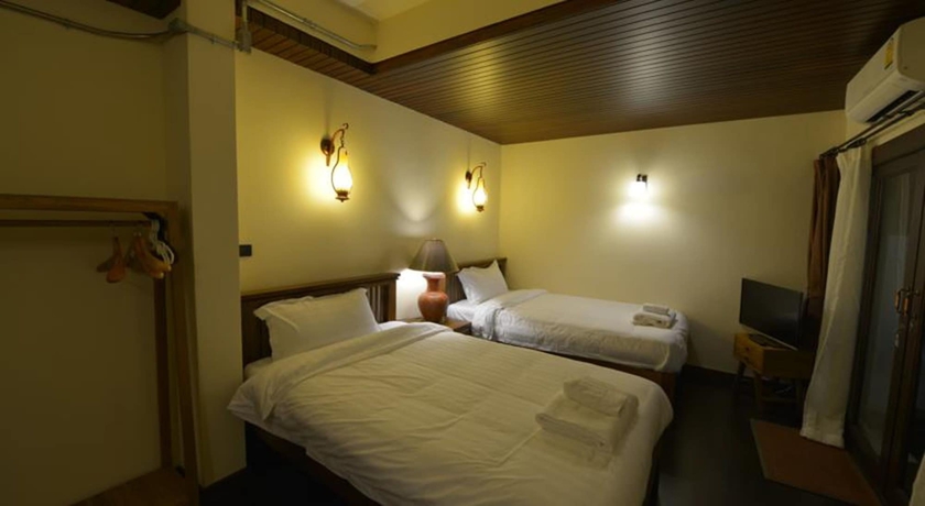 Imagen de la habitación del Hotel Yi's Garden Villa. Foto 11