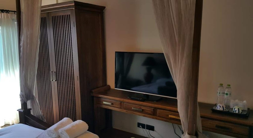 Imagen de la habitación del Hotel Yi's Garden Villa. Foto 12