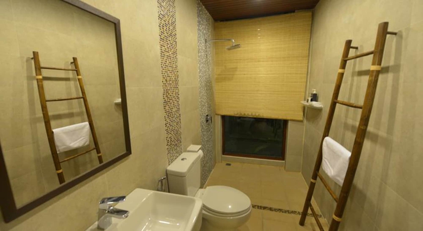 Imagen de la habitación del Hotel Yi's Garden Villa. Foto 13