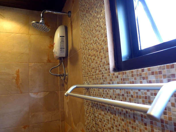Imagen de la habitación del Hotel Yi's Garden Villa. Foto 14