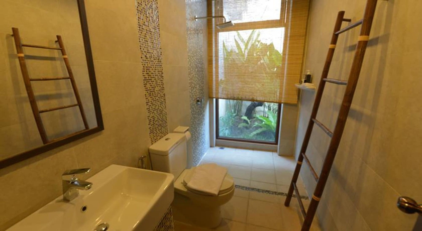 Imagen de la habitación del Hotel Yi's Garden Villa. Foto 15