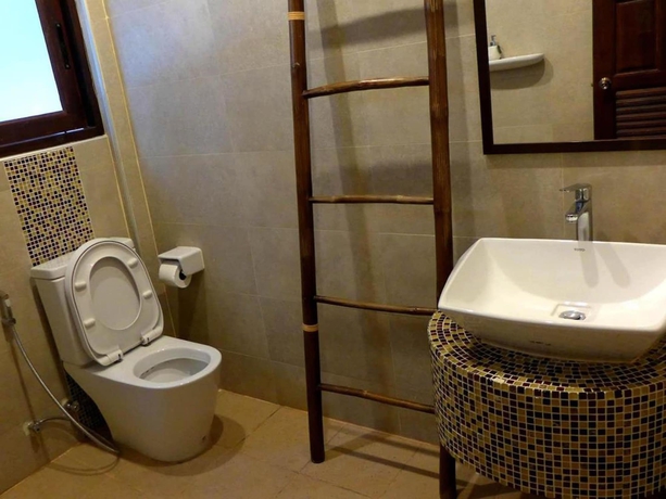 Imagen de la habitación del Hotel Yi's Garden Villa. Foto 16
