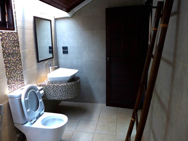Imagen de la habitación del Hotel Yi's Garden Villa. Foto 17