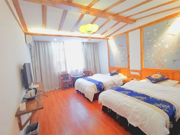 Imagen de la habitación del Hotel Yishan Inn. Foto 14