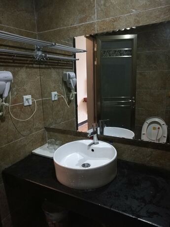 Imagen de la habitación del Hotel Yishan Inn. Foto 15