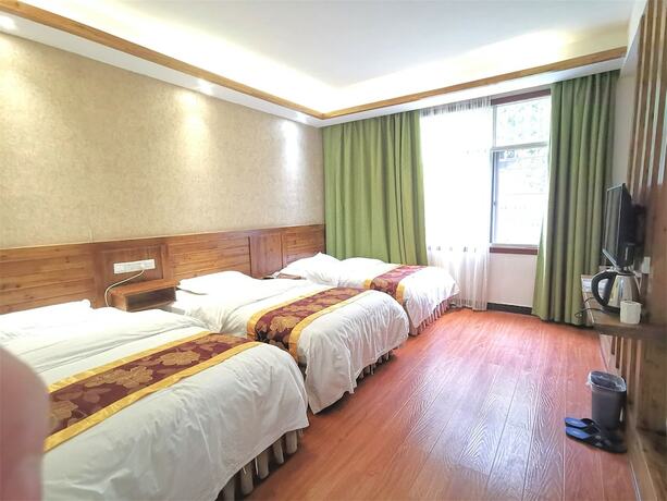 Imagen de la habitación del Hotel Yishan Inn. Foto 16