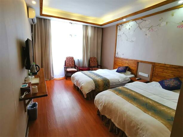 Imagen de la habitación del Hotel Yishan Inn. Foto 17