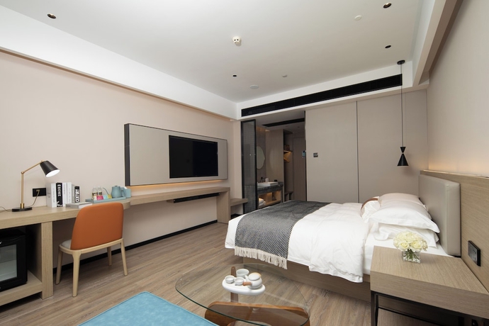 Imagen de la habitación del Hotel Yishang. Foto 6